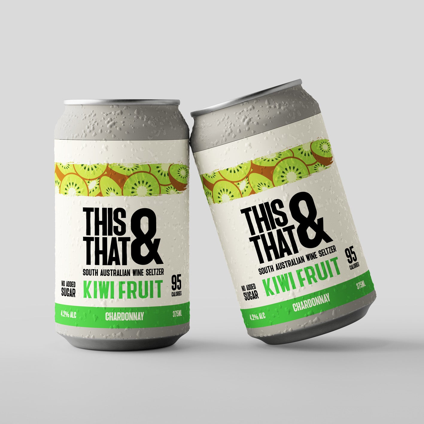 Two cans of 'This & That' South Australian wine seltzer with kiwi fruit flavor on a gray background.